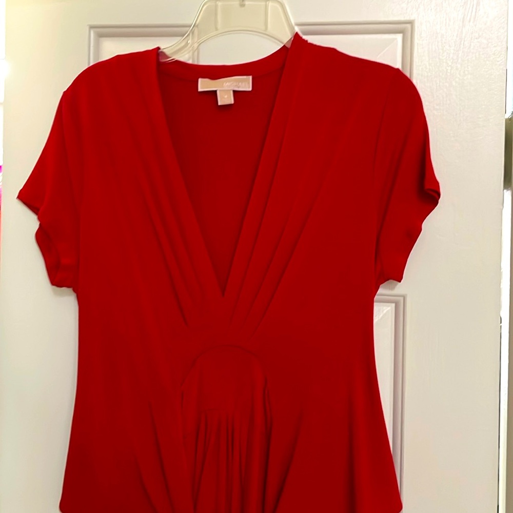 Michael Kors lady in red belted dress